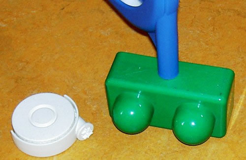 een wieltje van het droogrek is afgebroken